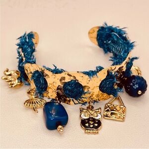 Gold and Blue Dangling Charm Cuff Bracelet with Denim Textile Accents